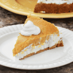 A slice of no bake pumpkin pie on a white plate - 9