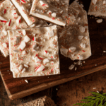 Close up image of Peppermint Bark on a wooden cutting board - 8