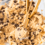 Chickpea Cookie Dough being portioned with a golden scoop - 13