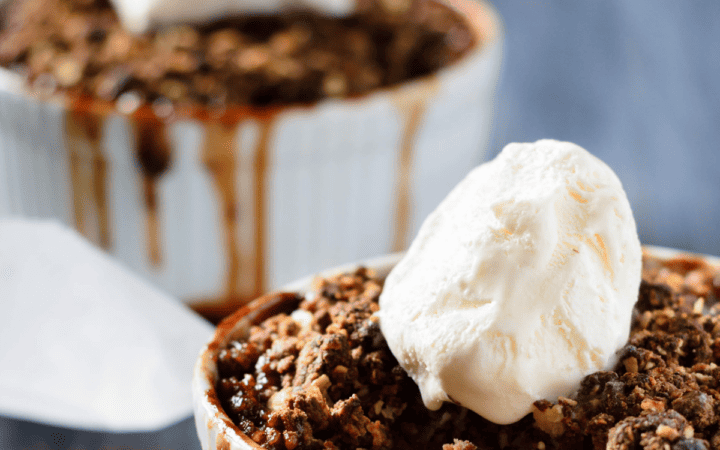 Close up image of two bowls of chocolate cobbler