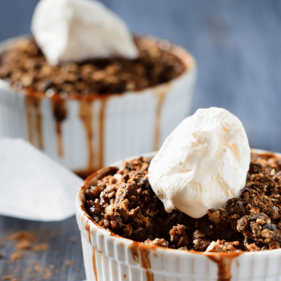Close up image of two bowls of chocolate cobbler