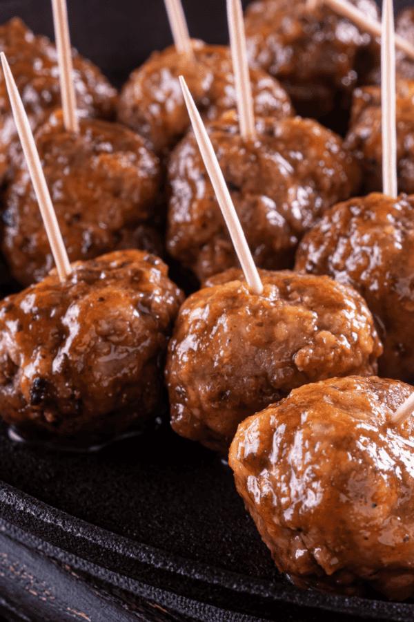 Close up image of Cocktail Meatballs with toothpicks