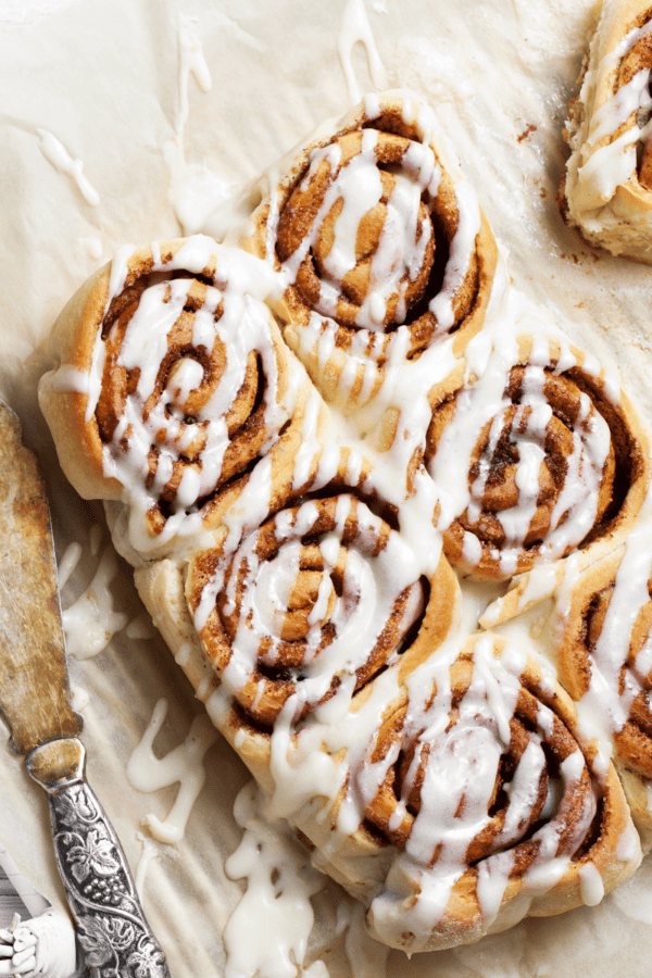 Overhead image of Tiktok Cinnamon Rolls drizzled with frosting