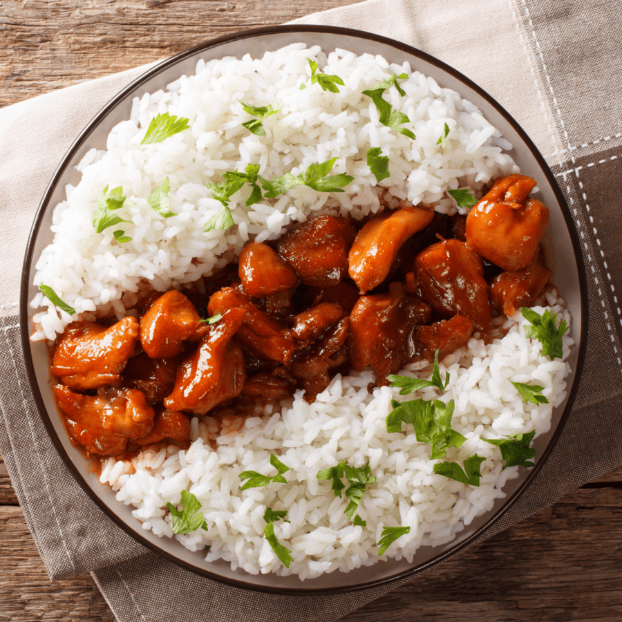 Overhead image of Bourbon Chicken on a plate with steamed rice