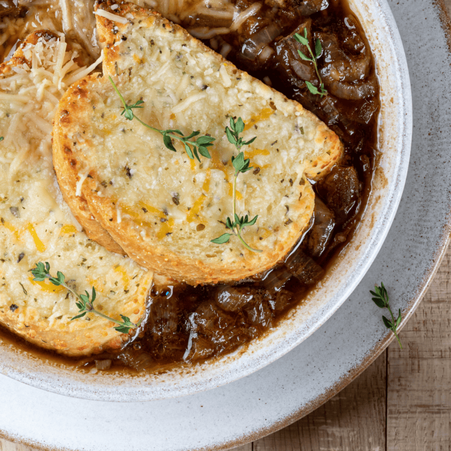 close up image of a bowl of instant pot french onion soup