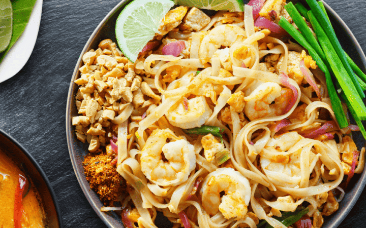 Overhead image of Shrimp Pad Thai in a bowl with garnish