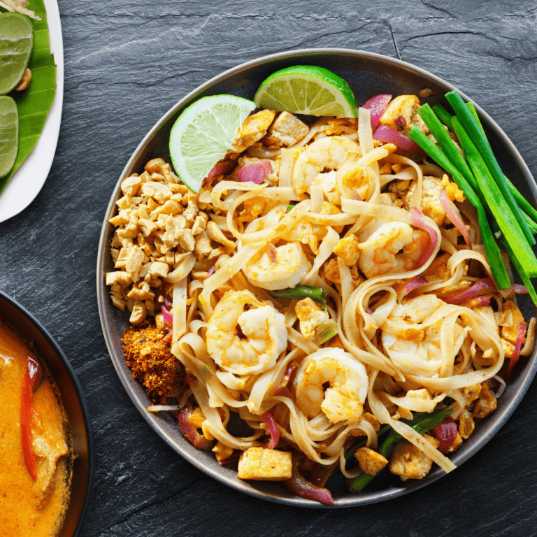 Overhead image of Shrimp Pad Thai in a bowl with garnish