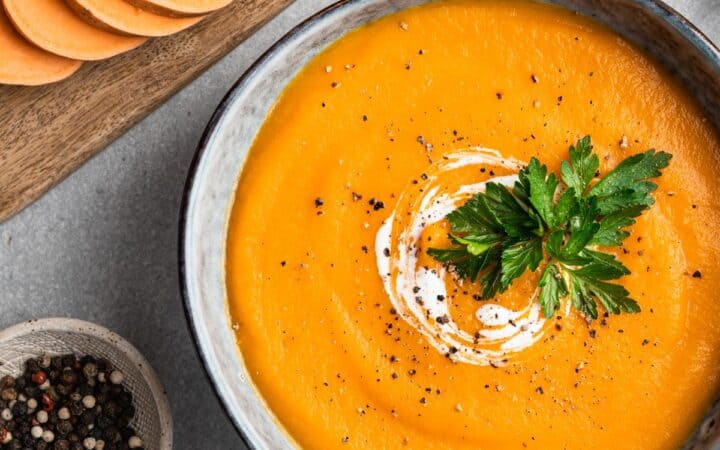 Overhead image of Sweet Potato Soup in a rustic bowl