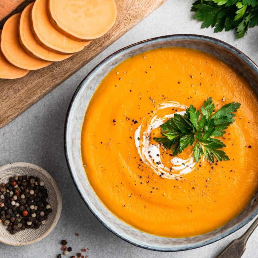 Overhead image of Sweet Potato Soup in a rustic bowl