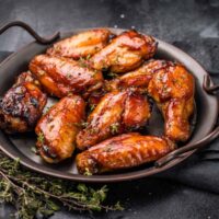 Hot Honey Wings on a metal serving platter