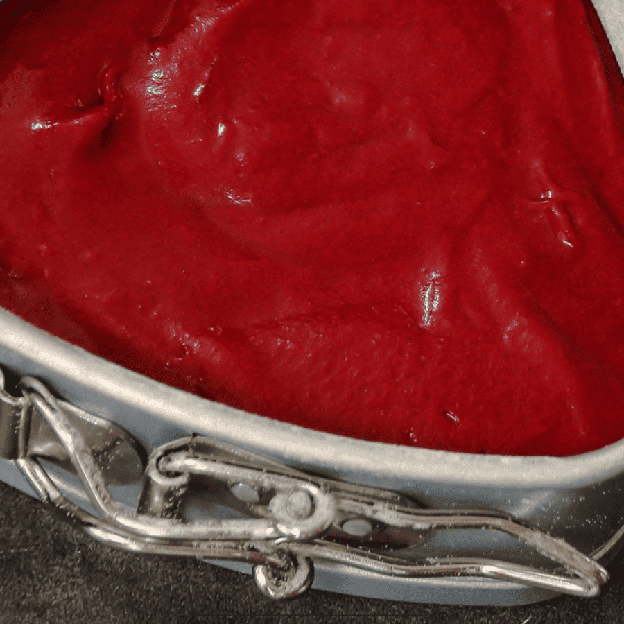 Red Velvet Brownie Batter in a springform pan