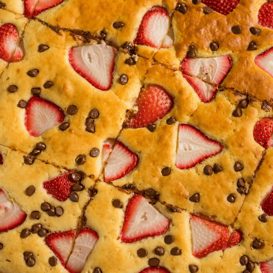Close up image of strawberry and chocolate chip Sheet Pan Pancakes