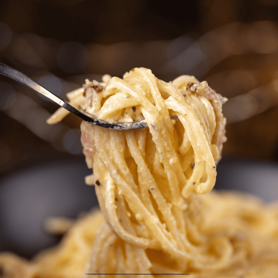 Close up image of Spaghetti Carbonara on a fork