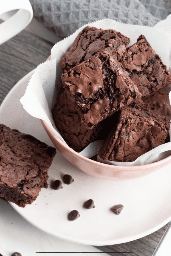Overhead image of Vegan brownies in a bowl on a white saucer