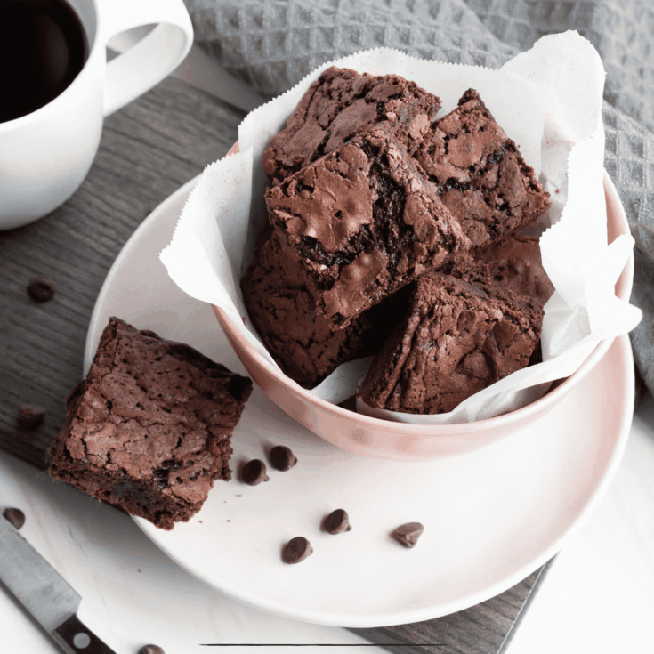Overhead image of Vegan brownies in a bowl on a white saucer
