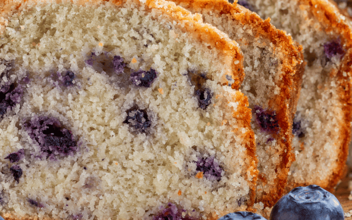 Close up image of sliced lemon blueberry loaf cake