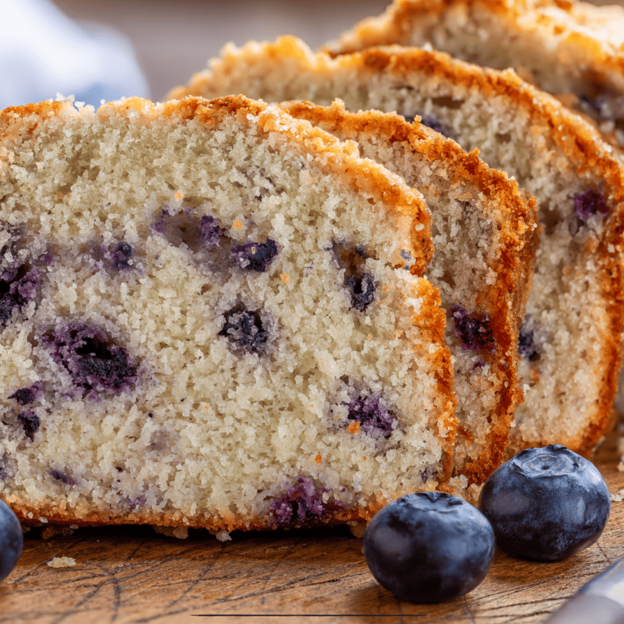 Close up image of sliced lemon blueberry loaf cake
