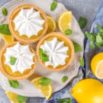Overhead image of Mini Lemon Tarts on a white plate