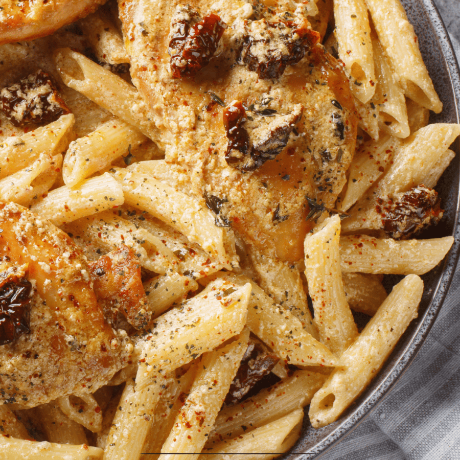 Close up image of marry me chicken pasta in a bowl