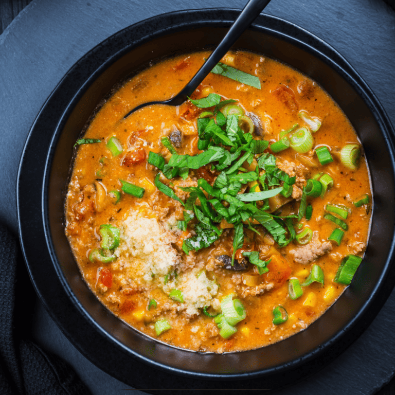 Overhead image of Pizza Soup in a black bowl