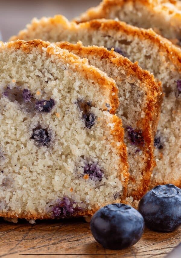 Close up image of sliced lemon blueberry loaf cake