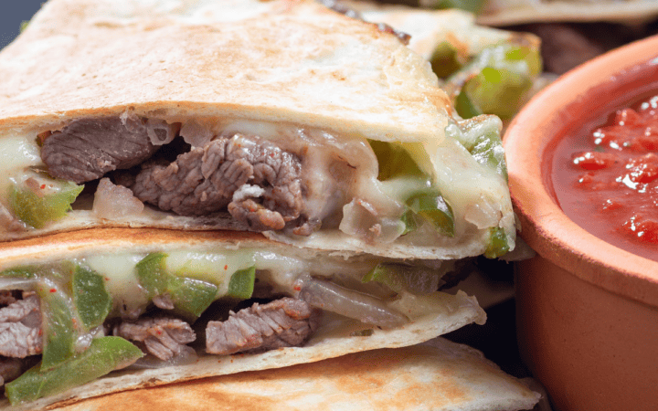 Steak Quesadillas with a bowl of salsa