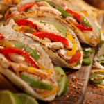 Close up image of Air Fryer Fajitas on a wooden surface - 8