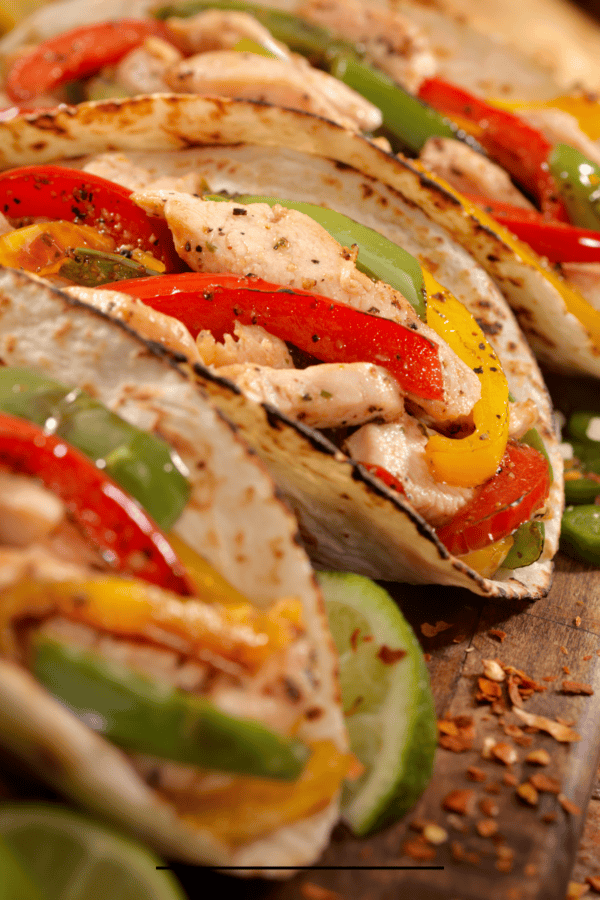 Close up image of Air Fryer Fajitas on a wooden surface