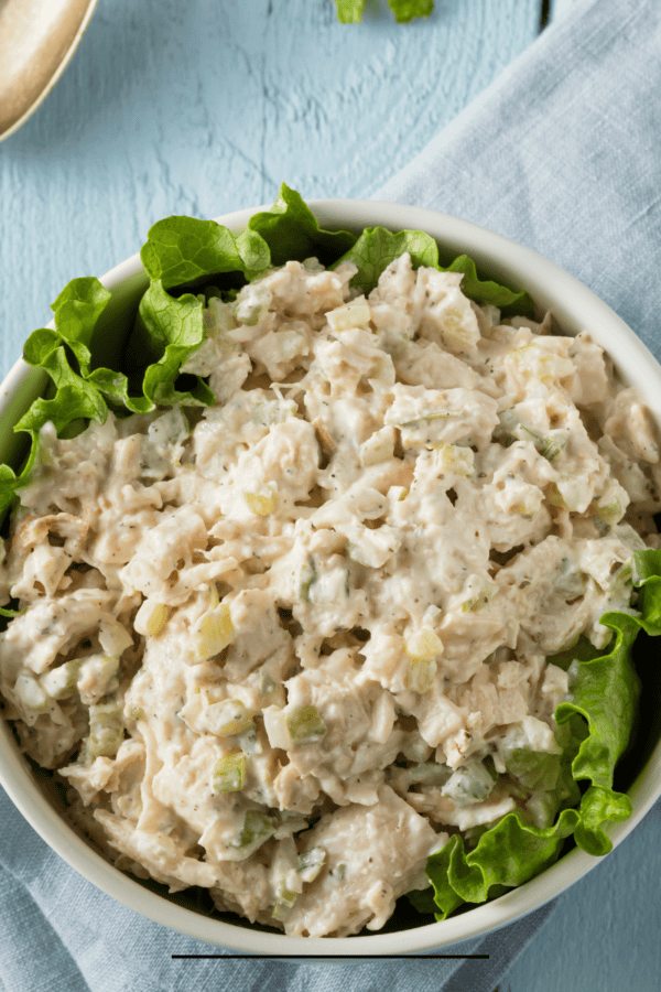 Overhead image of Canned Chicken Salad in a bowl with lettuce