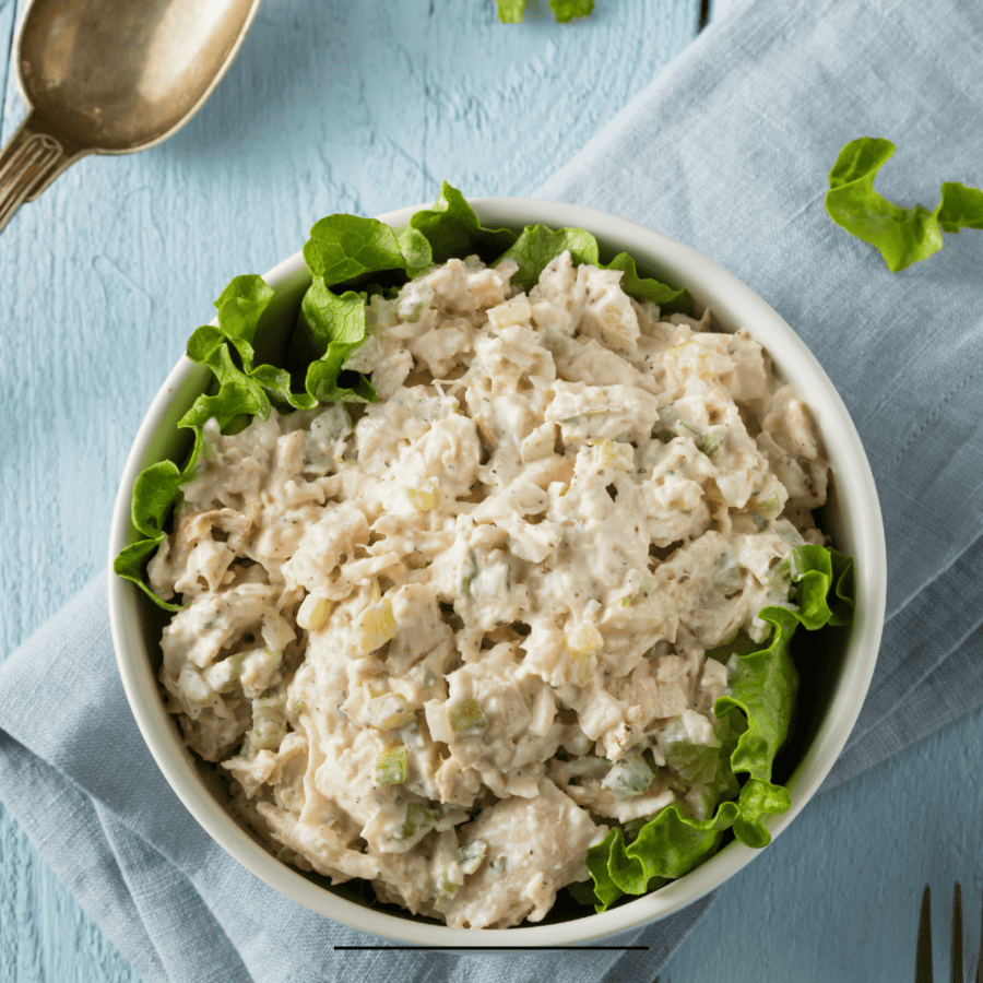 Overhead image of Canned Chicken Salad in a bowl with lettuce