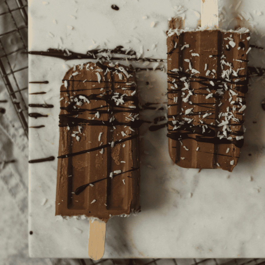 Overhead image of two Fudgesicles on a marble slab