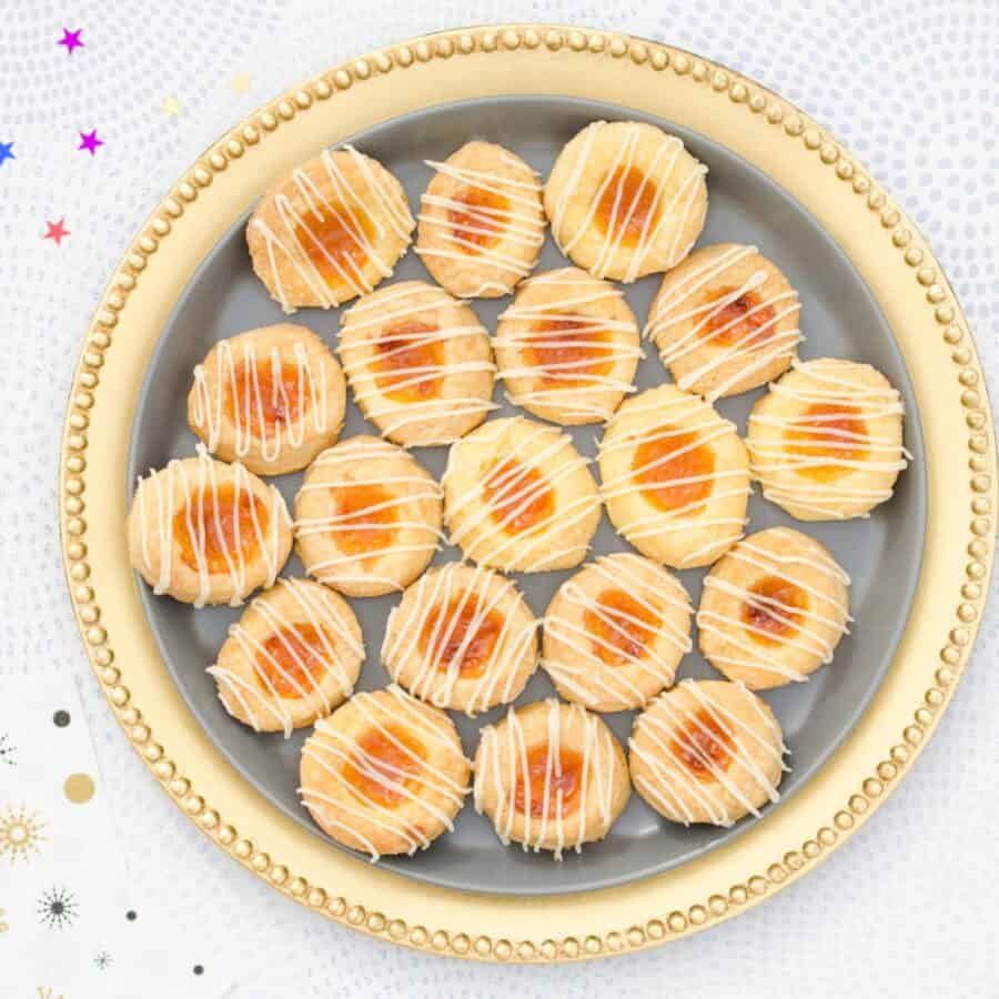 Overhead image of homemade kolaches on a decorative plate