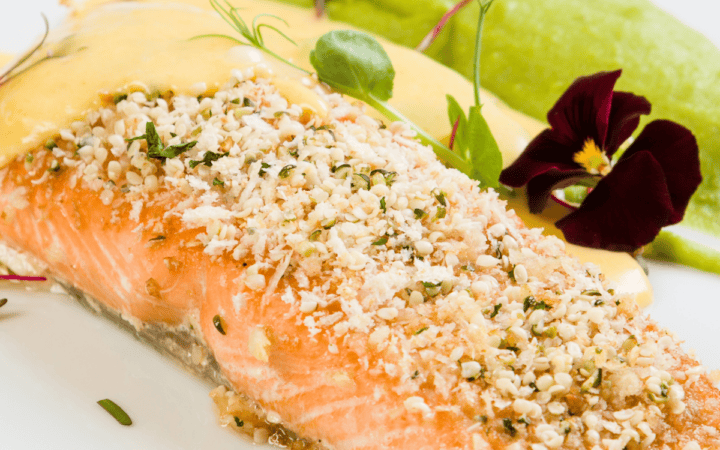 Parmesan Crusted Salmon on a white plate