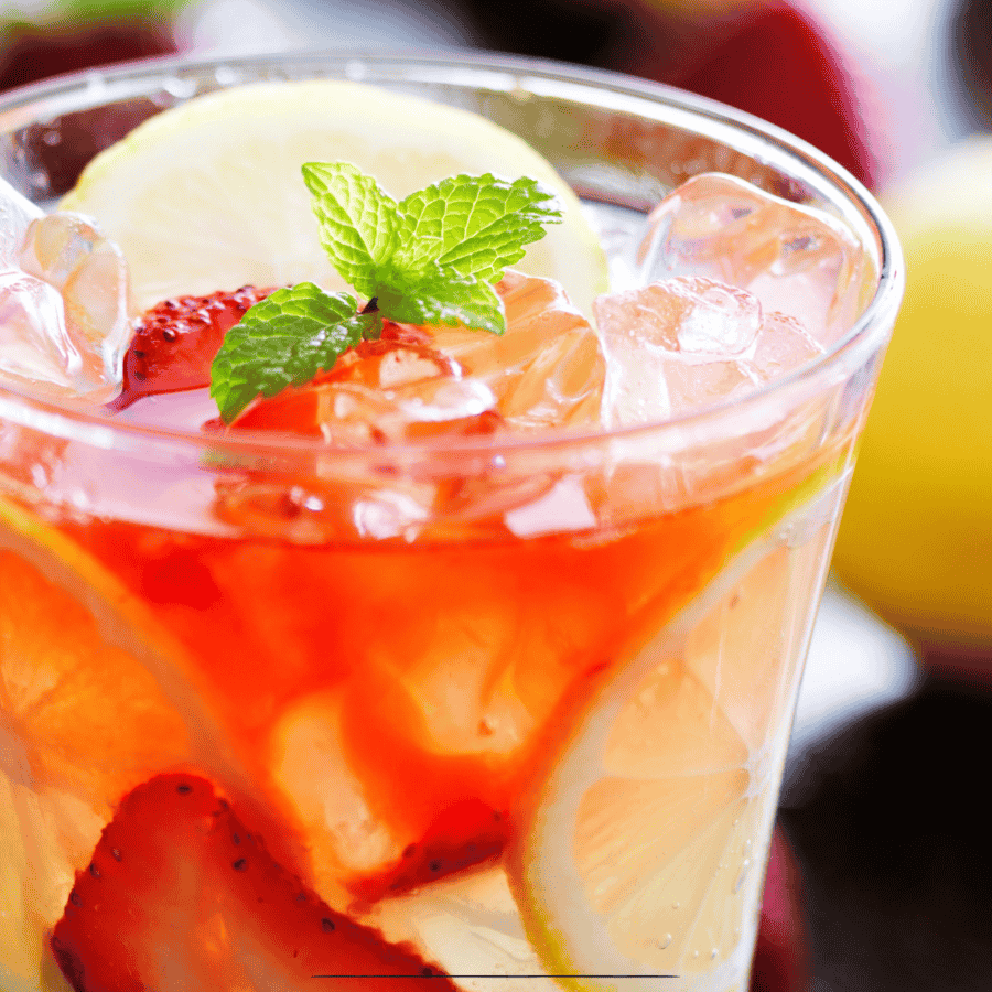 Close up image of a glass of strawberry lemonade