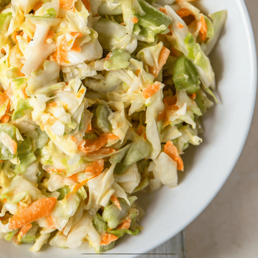 Close up image of Vegan Coleslaw in a white bowl
