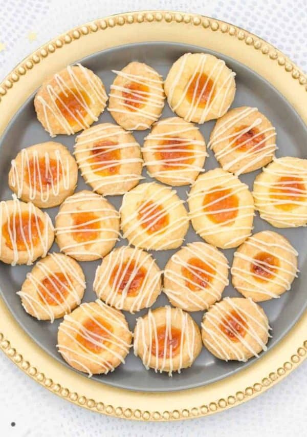 Overhead image of homemade kolaches on a decorative plate