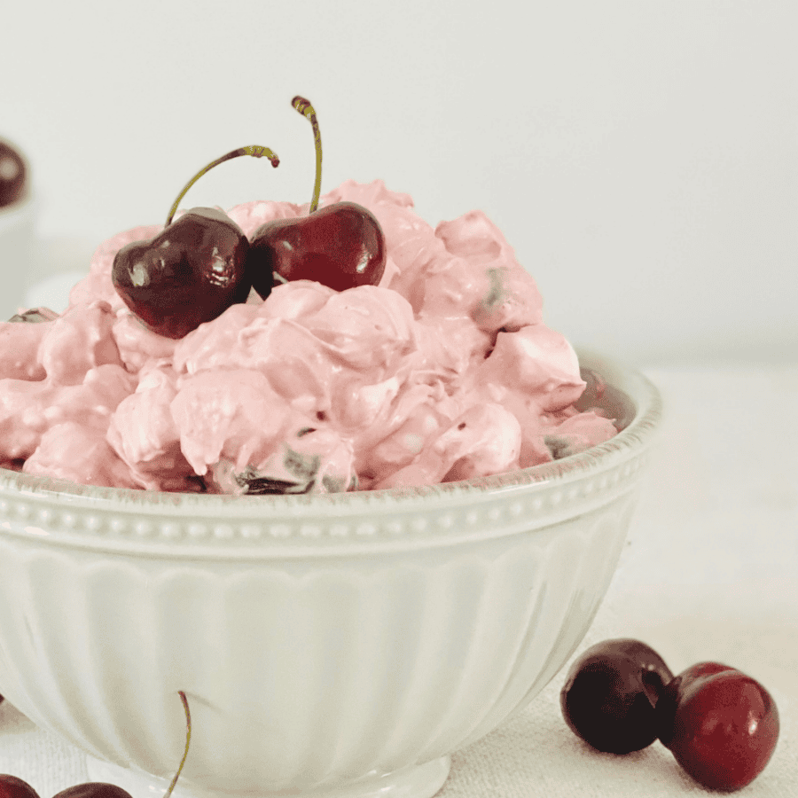 Close up image of cherry fluff in a white bowl