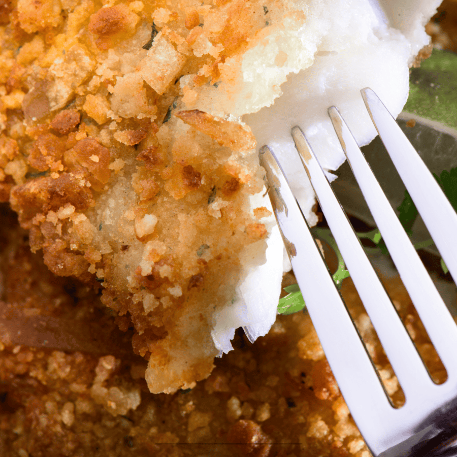 Close up image of a fork piercing Fish Nuggets