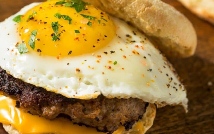 Sausage McMuffin Sandwich on a wooden serving plate