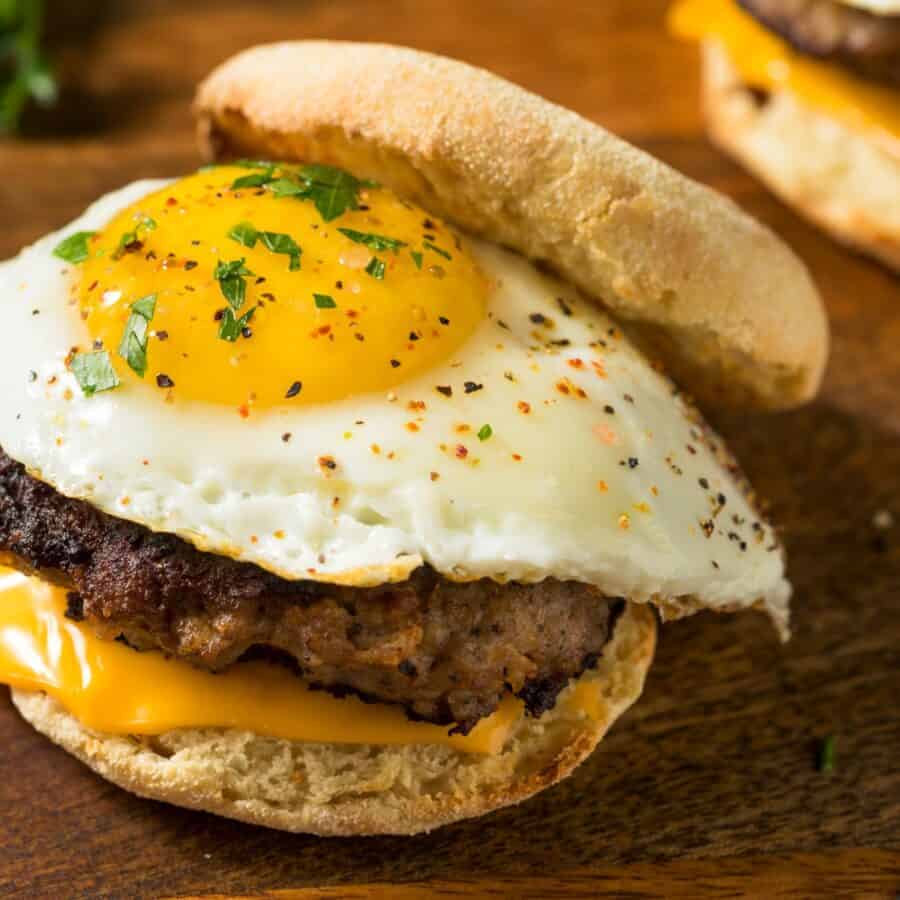 Sausage McMuffin Sandwich on a wooden serving plate