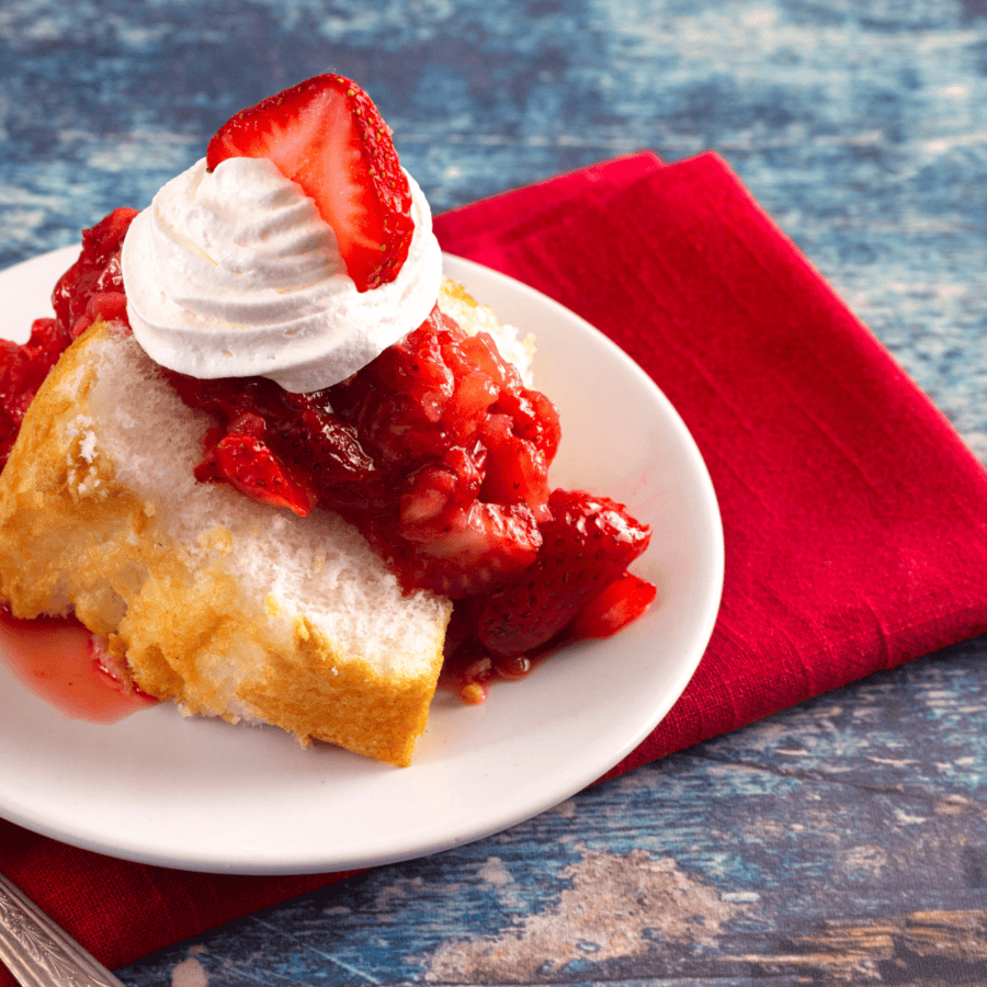 Close up image of strawberry angel food cake on a  plate