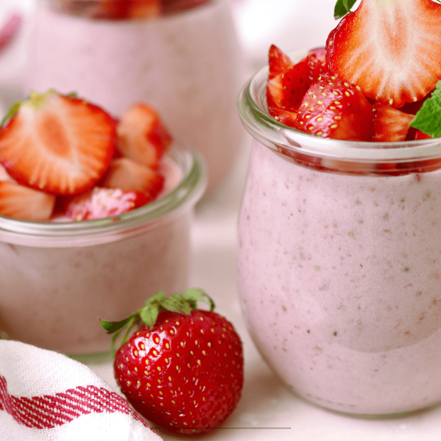 Close up image of Strawberry Mousse in glass jars