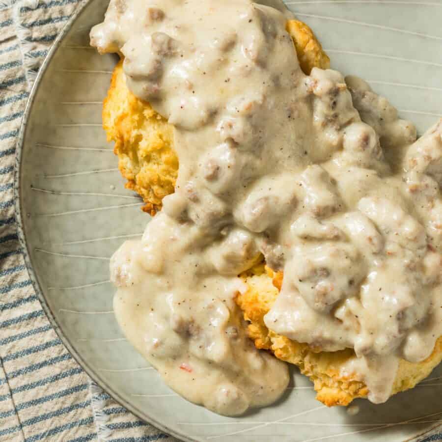 Overhead image of biscuits and gravy on a plate