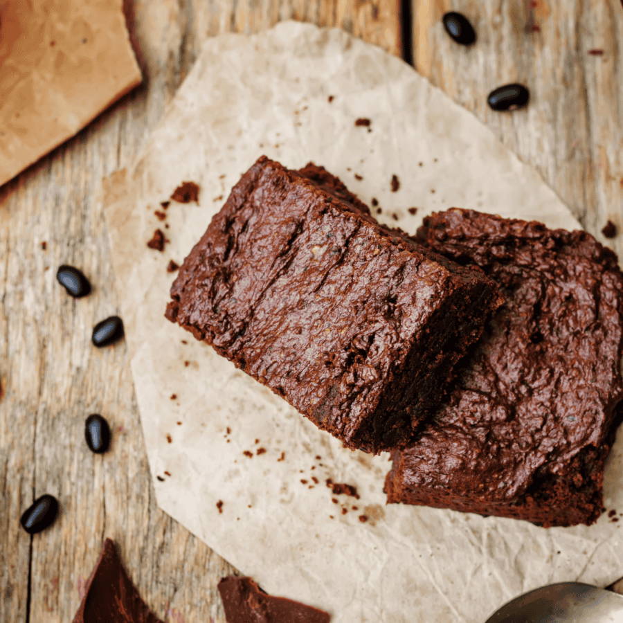 Overhead image of black bean brownies on parchment paper