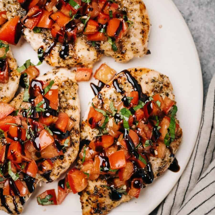 Overhead image of Bruschetta Chicken on a white plate