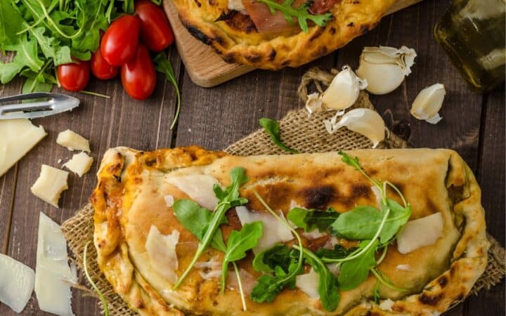 Overhead image of a garnished calzone