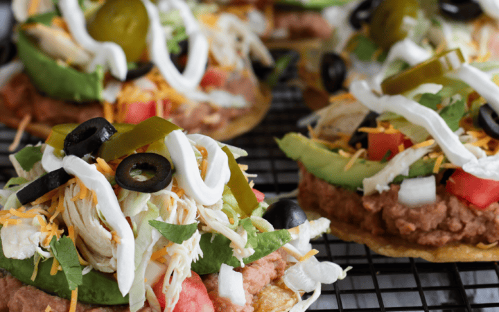 Mutliple Chicken Tostadas on a cooling rack