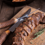 Sliced Grilled Pork Tenderloin on a wooden cutting board - 8