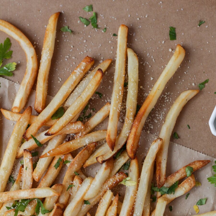 Overhead image of Oven Baked Fries on brown parchment paper