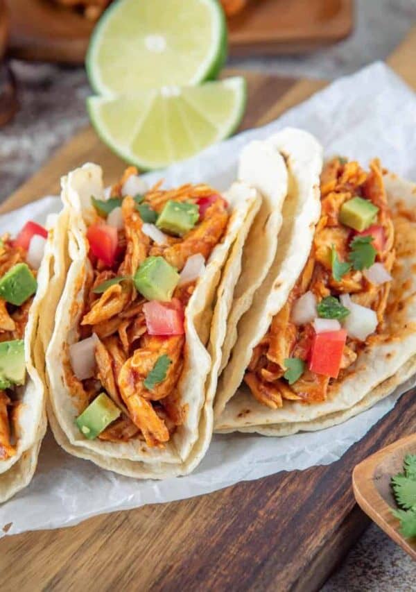 Three Chicken Street Tacos on parchment paper